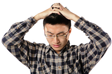 Image showing Worried man having headache