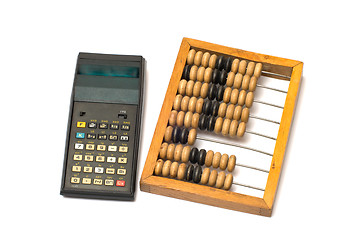 Image showing Calculator and wooden abacus.