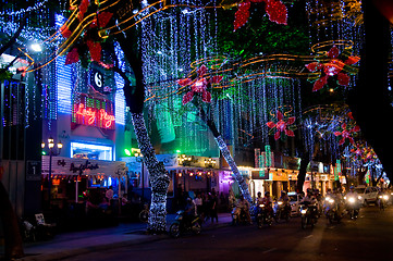 Image showing Street and shops decorated for Christmas in Vietnam