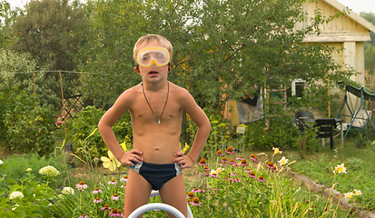 Image showing Child wearing a mask.