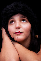 Image showing thoughtful and beautiful woman, looking up