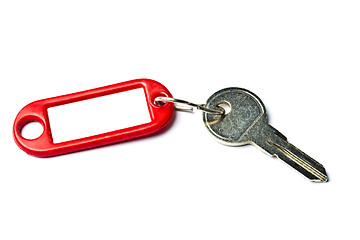 Image showing Blank tag and a key isolated on white 