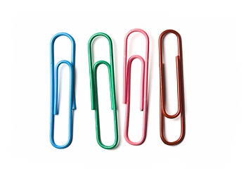 Image showing Four multicolored paperclips