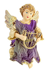 Image showing A Christmas ornament of an angel holding a harp. Isolated over white background. (14MP camera)