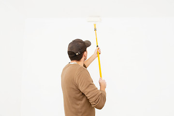 Image showing Man painting