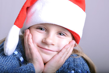 Image showing cute little smiling Santa girl