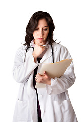Image showing Doctor looking at patient record chart