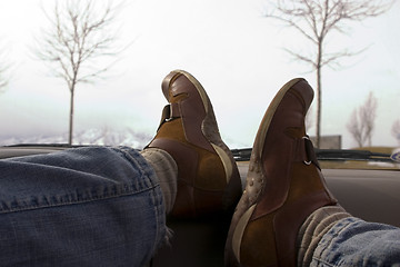 Image showing Feet on the Dashboard Relaxing