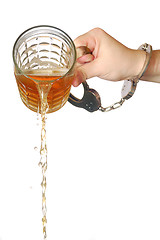 Image showing pouring beer away