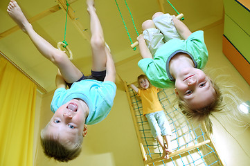 Image showing children hanging on gymnastic rings