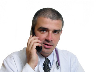Image showing Doctor speaking to the phone
