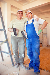 Image showing smiling plasterers