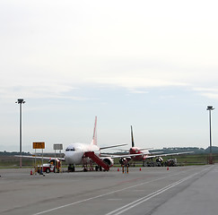 Image showing Back to back airplanes