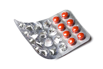 Image showing red pills isolated on white 