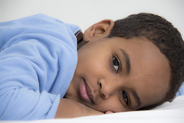 Image showing Boy resting in his bed