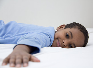 Image showing Boy resting in his bed