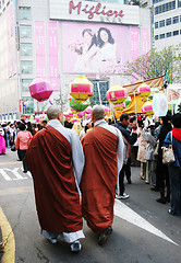 Image showing Monks carrying lanterns
