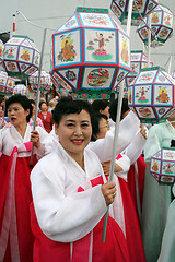 Image showing Carrying lanterns