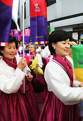 Image showing Carrying lanterns