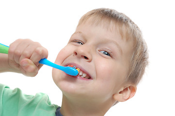 Image showing child cleaning teeth