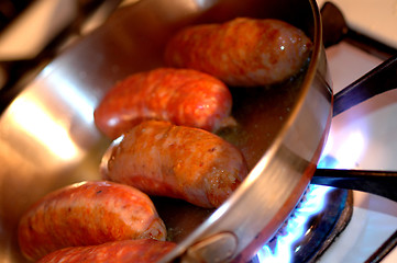 Image showing italian sausage frying