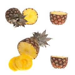 Image showing Whole and half pinapple