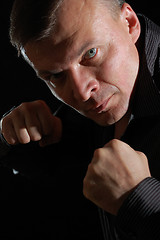 Image showing angry man boxing