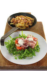 Image showing Fried potatoes with meat jelly