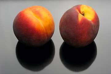 Image showing Peaches on a black background.