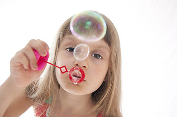 Image showing child blowing bubbles