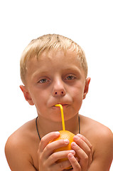 Image showing Child with an orange.