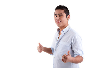 Image showing Young latin man with thumbs raised as a sign of ok