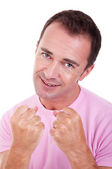 Image showing smiling man punching fist 