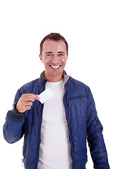 Image showing Portrait of a handsome man, with blank business card in hand