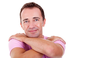 Image showing Portrait of a handsome middle-age man, with arms crossed