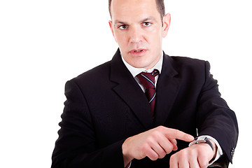 Image showing upset businessman pointing to the watch