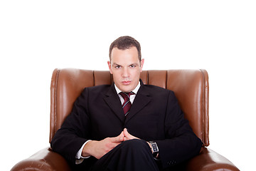 Image showing Businessman seated on a chair