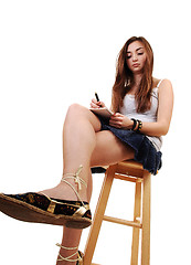 Image showing Young girl sitting.