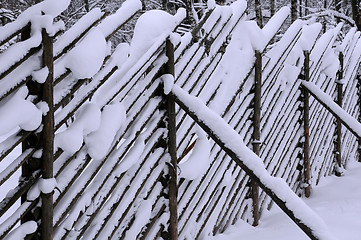 Image showing Fence Covered with Snow
