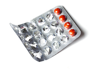 Image showing  red pills isolated on white