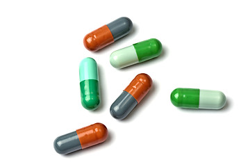 Image showing A few colorful capsules isolated on white 