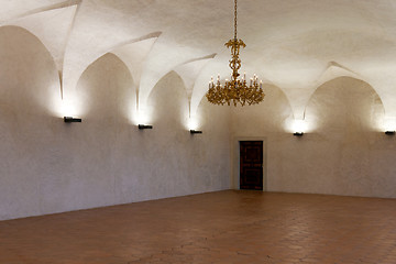 Image showing Room in the castle with a gold chandelier