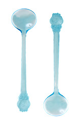 Image showing Two blue transparent plastic spoons