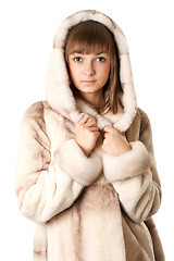 Image showing A beautiful young girl in a fur coat