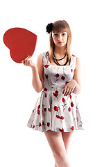 Image showing Beautiful girl in gown with red colour and heart in hand