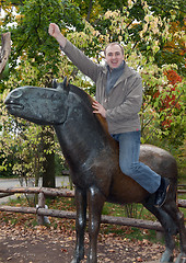 Image showing Man on a brass horse monument