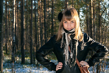 Image showing Young beautiful girl in black jacket