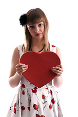 Image showing Beautiful girl in gown with red colour and heart in hand