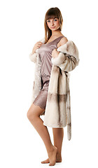 Image showing A beautiful young girl in a fur coat