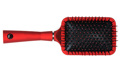 Image showing One red massages comb